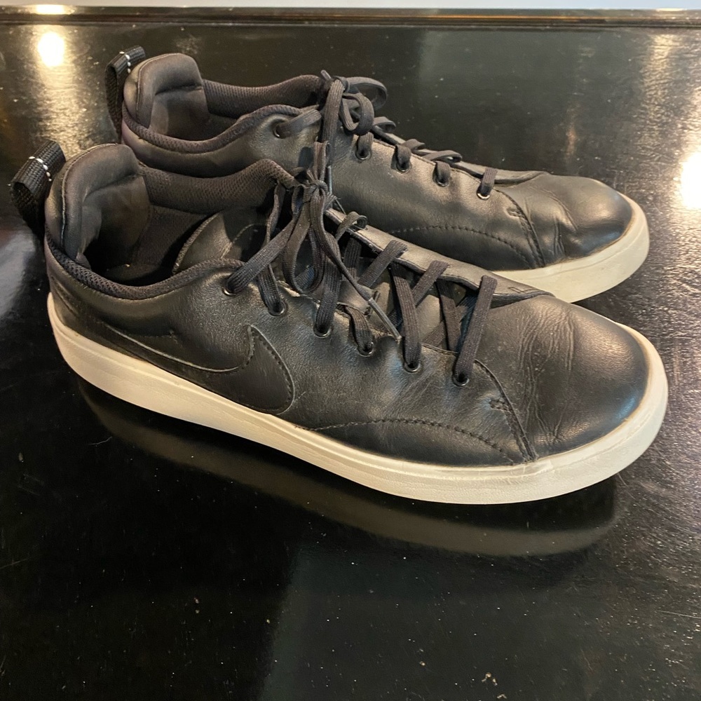 Men’s Nike soft spike golf shoes.